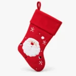 Solid red Christmas stocking with Santa