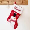 Red and white Christmas stocking with name and snowman