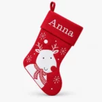 Red Christmas stocking with merry reindeer