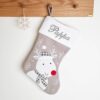 Gray Christmas stocking with curious reindeer, 45 cm