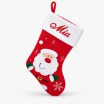 Red xmas stocking with santa motif
