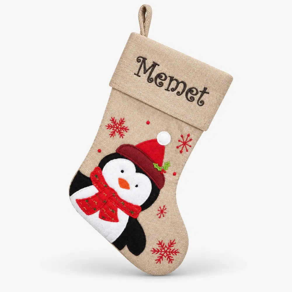 brun-vavd-strumpa-med-pingvin-45-cm Brown woven Christmas stocking with penguin