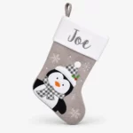 Gray Christmas stocking with little penguin, 45 cm