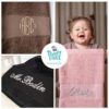 Towels with name embroidered and a child