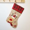 Plaid Christmas stocking with name and reindeer