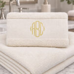 Ivory towel in bathroom with monogram