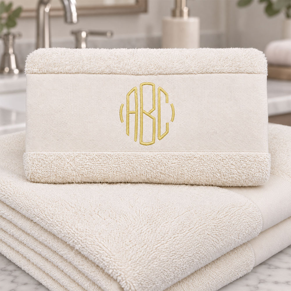 Ivory towel in bathroom with monogram