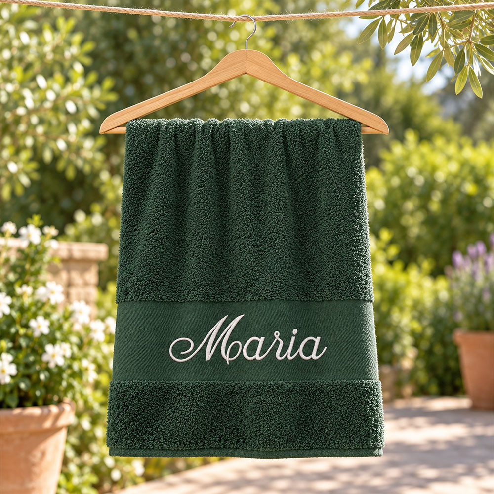 Dark green towel with name embroidered