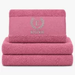 magnolia colored towel with name embroidered