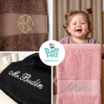 Collage of personalized towels in charcoal, white, black, and blue, embroidered with names and monograms.